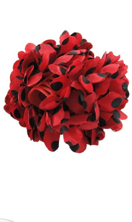 Fiore rosso con pois neri